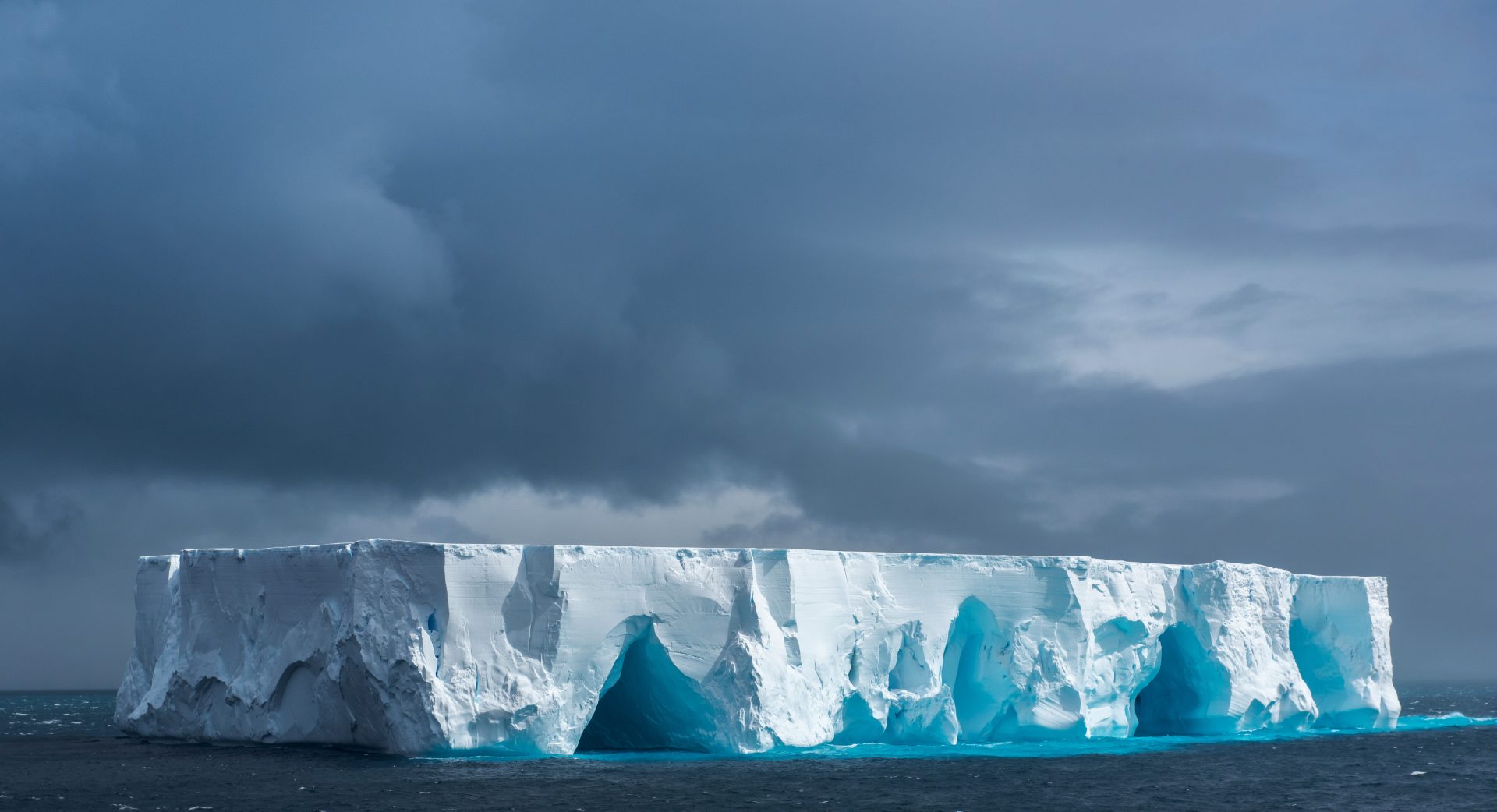 Antarctica Iceberg in sea with ice walls