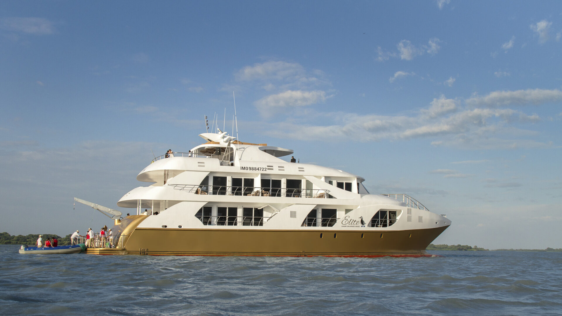 luxury yacht charter Galapagos: Exterior view of the Elite catamaran sailing in the Galapagos