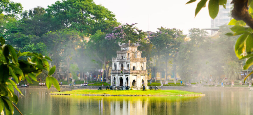 Turtle Tower in Hanoi Hoan Kiem foggy lake in Vietnam
